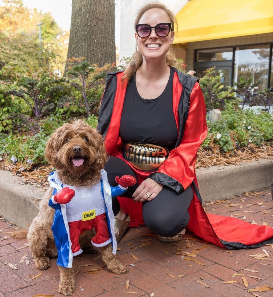 Dog and owner in Halloween Costume. Dogma Dog Bakery, Shirlington, Arlington, VA