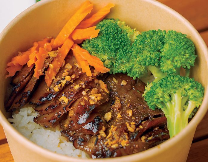 Rice bowl with grilled pork at Padaek pop-up Khao Nom